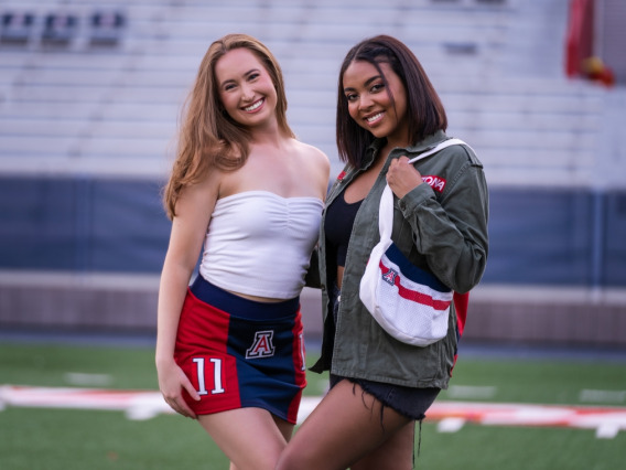 University of Arizona students model clothing and accessories from REPLAY Arizona, a vintage fashion line