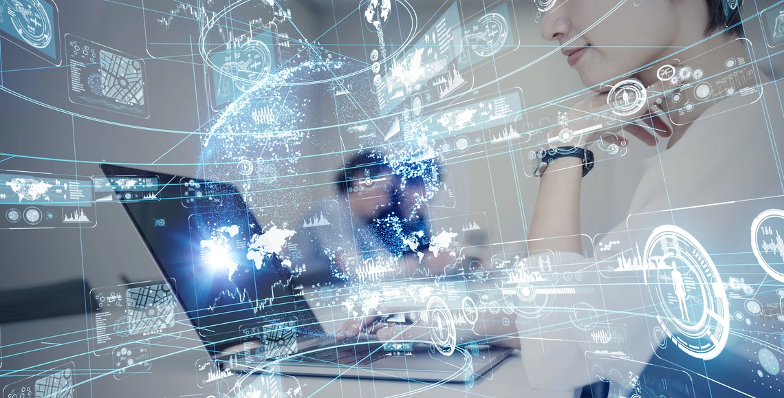 Superimposed graphs and other data visualization methods over an image of a student at a laptop