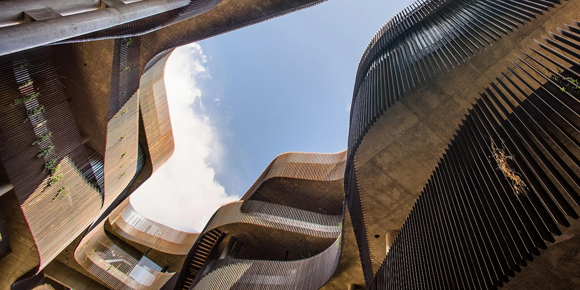 A ground view of the ENR2 building's slot canyon design