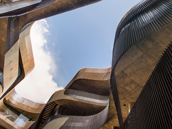 A ground view of the ENR2 building's slot canyon design