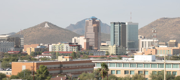 Downtown Tucson skyline during the day with A Mountain in the background