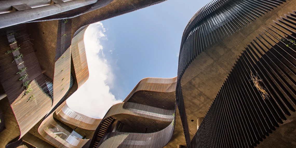 A ground view of the ENR2 building's slot canyon design
