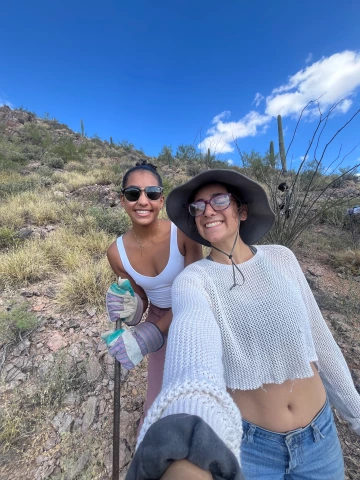 Stephanie Winick hiking with a friend