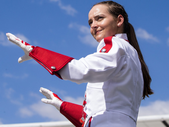 Grace Adams as one of the drum majors of the University’s premier marching band, the Pride of Arizona.